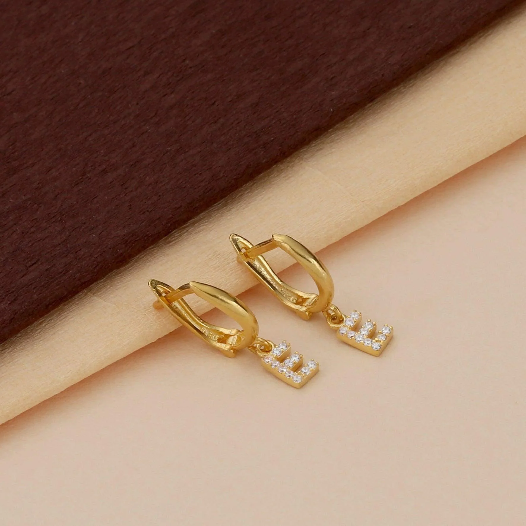 Diamond Studded Initial Earrings in Hoops & Studs - Image 7